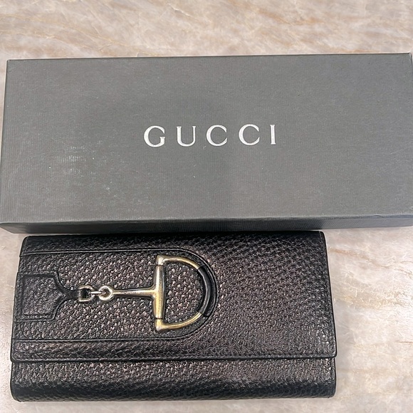 Gucci large horse-bit black pebble leather wallet. - Picture 1 of 10